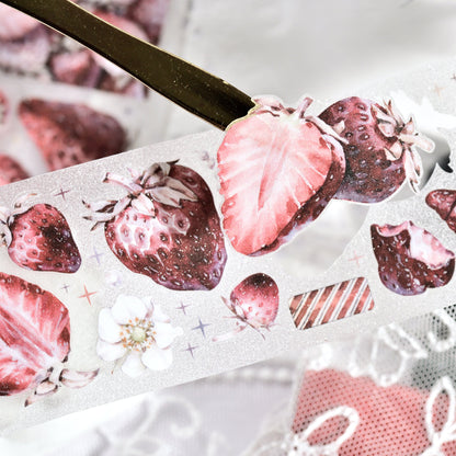 Handheld view of Antique Strawberry die-cut PET tape showing vintage red tones and matte texture
