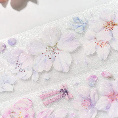 Cherry Blossom Glitter Sand PET die-cut tape die-cut edges with layered sakura silhouette and sparkling grain on white background